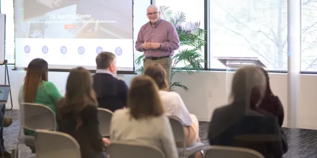 A Graduate School USA instructor teaching a live online session